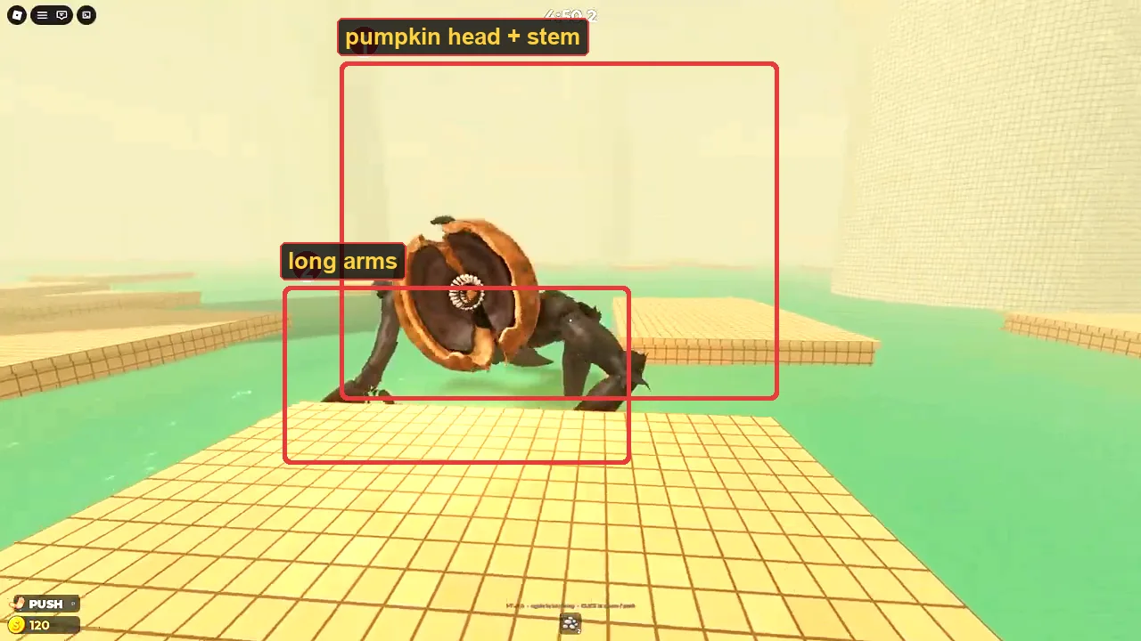 The DONT SPLASH monster up close: pumpkin-shaped head, dark stem, thick arms and the toothed mouth marked
